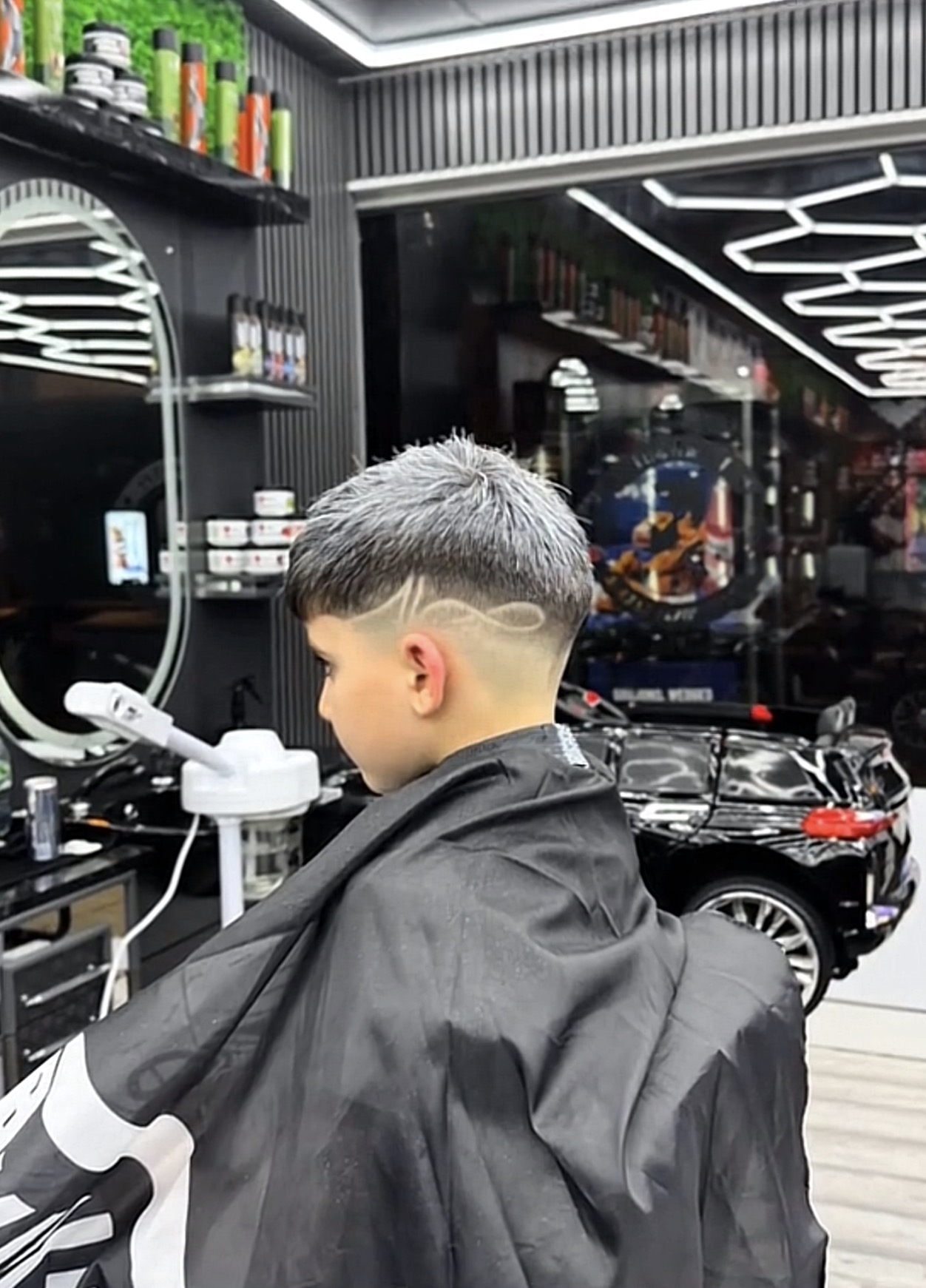 Kids grey-dyed crop with hair design and skin fade