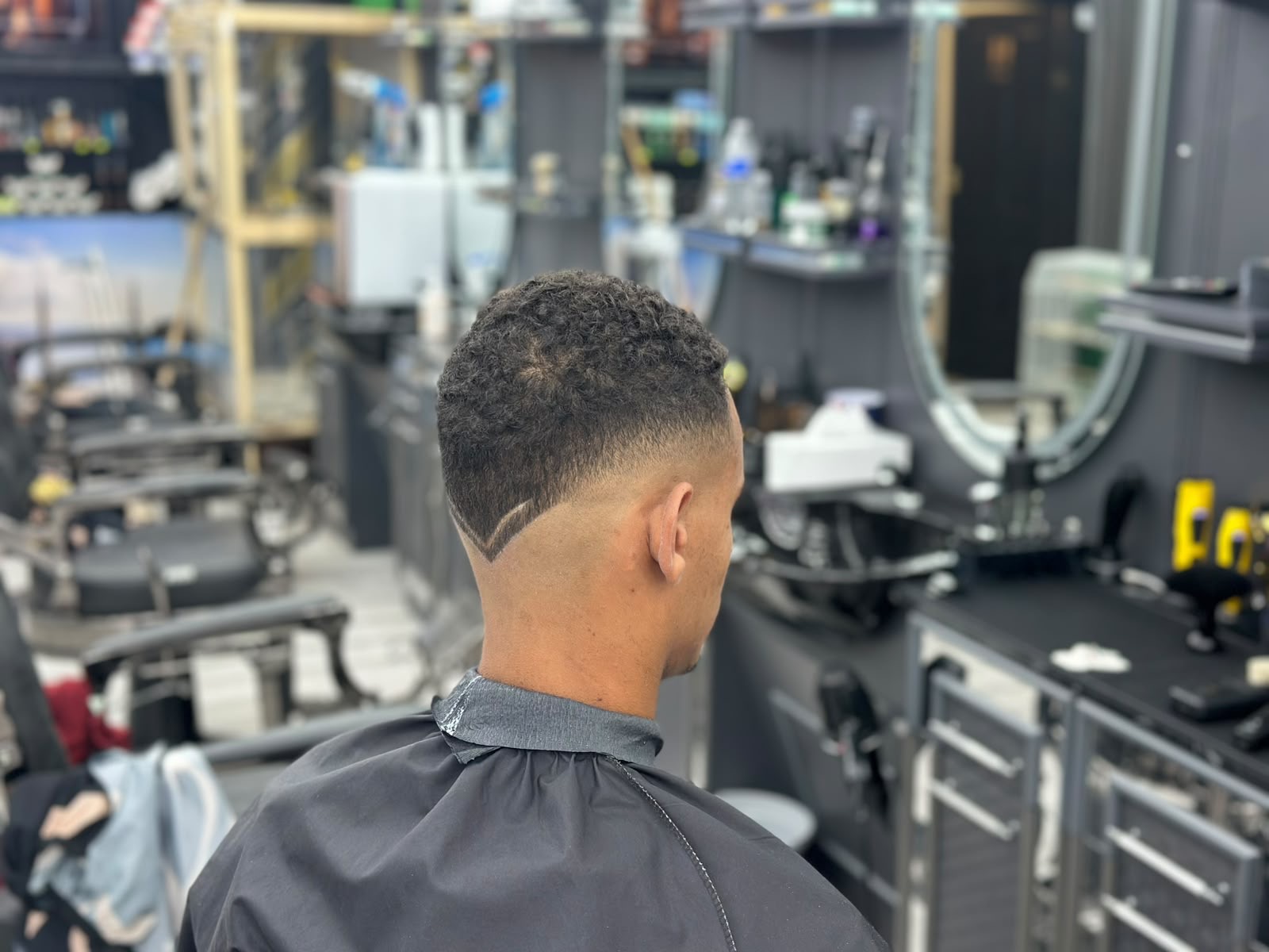 Skin fade with V-shaped neck design