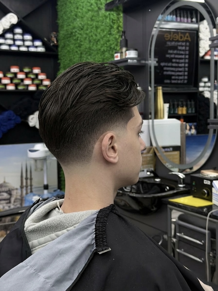 Slick back with low taper fade